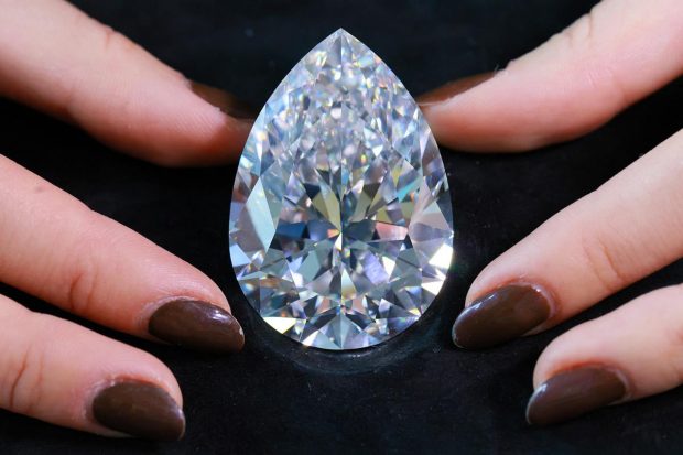 The Rock, a 228.31 carat pear-shaped stone roughly the size of a golf ball, is expected to sell for up to $30 million. (Reuters Photo)
