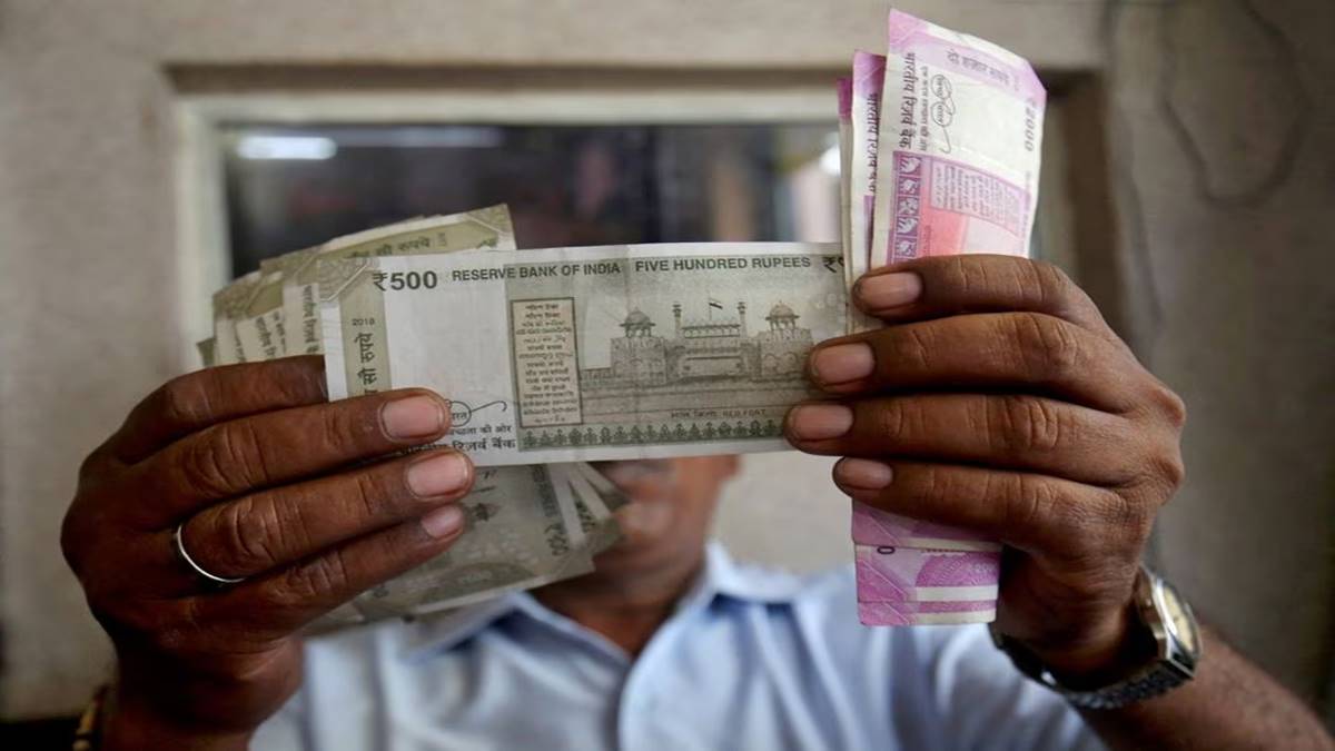 Rupee poised for monthly decline, premiums little changed in July