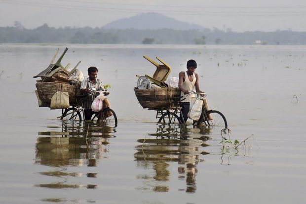 The devastating floods caused by incessant rainfall has affected 112 revenue circles and 4941 villages forcing 2,71,125 people to take shelter in 845 relief camps. (PTI Photo)