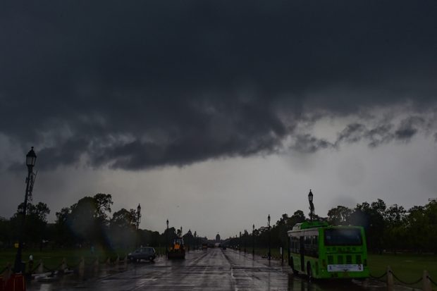 Monsoon clouds gather over the Raisina Hill sky in New Delhi. (PTI)