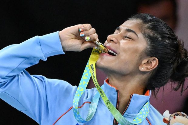 Boxer Nikhat Zareen with the gold medal after winning the final of 48kg-50kg (Light Flyweight) boxing match, at the Commonwealth Games 2022 in Birmingham, UK. (PTI Photo)