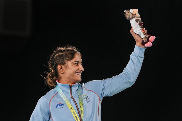 Gold medallist Vinesh Phogat during the Women's Freestyle Wrestling 53kg Nordic event medal ceremony at the Commonwealth Games (CWG), in Birmingham, UK. (PTI Photo)