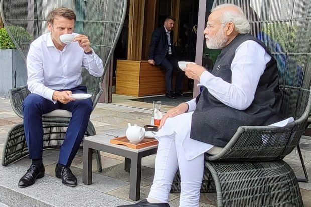 Prime Minister Narendra Modi interacts with President of France Emmanuel Macron during a meeting on the sidelines of G-7 Summit, in Germany. (PTI Photo)