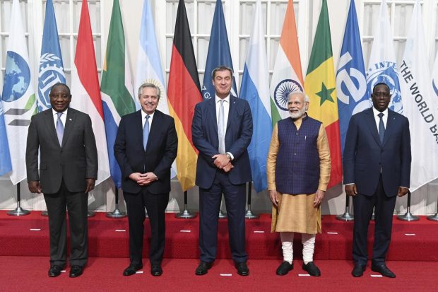 From left, Cyril Ramaphosa, President of South Africa, Alberto Angel Fernandez, President of Argentina, Markus Soder (CSU), Bavarian Minister-President, PM Narendra Modi, and Macky Sall, President of Senegal pose for a group photo at a reception at the Residenz, in Munich, Berlin. (AP Photo)