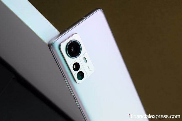 The Xiaomi 12 Pro has three cameras on the back - a 50MP main (Sony IMX 707) sensor behind an f/1.9 aperture lens with OIS, a 50MP ultrawide-angle with 115-degree field-of-view, and another 50 MP portrait sensor behind an f/1.9 lens. The phone is capable of up to 8k video recording (@24fps). (Photo credit: Saurabh Singh/Financial Express)