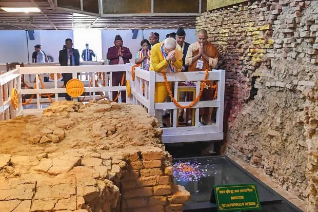 Prime Minister Narendra Modi and Nepal PM Sher Bahadur Deuba at the sacred Maya Devi Temple, Lumbini. (PTI Photo)