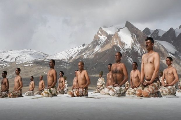 Indo-Tibetan Border Police personnel practise a yoga pose in Ladakh. “Yoga is the armour! The weather in Ladakh is no deterrent for these Himveers of Indo-Tibetan Border Police as they celebrate International Day Of Yoga with pride,” Commerce Minister Piyush Goyal tweeted. (Twitter/Piyush Goyal)