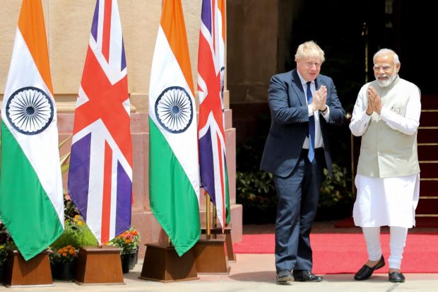 In the backdrop of the rapid geopolitical turmoil, Prime Minister Modi and his British counterpart Johnson agreed on a new and expanded India-UK defence partnership and vowed to seal an ambitious free trade agreement by the end of the year. (Reuters Photo)