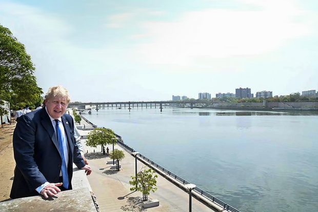 British PM Boris Johnson at the Sabarmati Riverfront during his visit to Sabarmati Gandhi Ashram, in Ahmedabad. (PTI Photo)