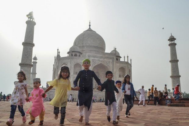 Muslim children celebrate the Eid festival near the Taj Mahal, in Agra. (PTI Photo)