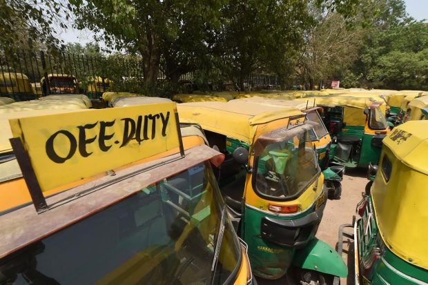 The auto, taxi and cab drivers also sat on a dharna near Chief Minister Arvind Kejriwal's residence in Civil Lines later in the day to press their demands. (PTI Photo)