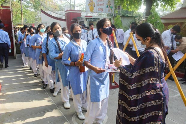 Meerut: Students arrive at an examination centre to appear for the CBSE Exams for Term 2, in Meerut. (PTI Photo)