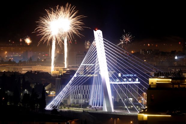 Fireworks explode in the sky behind the Millennium bridge while open-air celebrations are banned due to the coronavirus disease (COVID-19) restrictions in Podgorica, Montenegro. (REUTERS image)