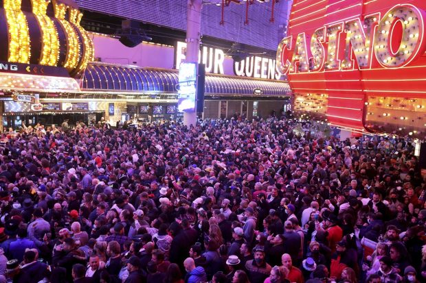 Revelers celebrate on New Year's Eve at the Fremont Street Experience in downtown Las Vegas Friday. (AP Photo)