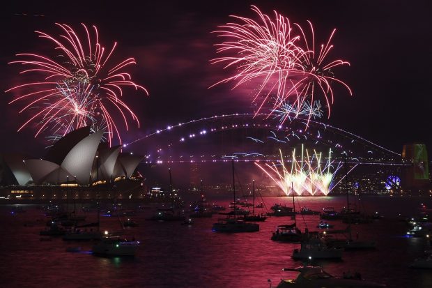 Visuals from Sydney as fireworks explode over the Sydney Opera House and Harbour Bridge as New Year's Eve celebrations begin. (AP Photo)