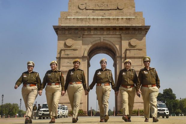 The newly inducted SHOs of Delhi Police, Pratibha Sharma (Vikaspuri), Poonam Pareek (Vivek Vihar), Alpana Sharma (RK Puram), Shivani Singh (Hauz Khas), Sapna Duggal (Defence Colony), and Malti Bana (Sonia Vihar), pose for photographs at India Gate, on International Women?s Day, in New Delhi. This is the first time that a large number of women police officers have been appointed as the SHOs of police stations. (PTI Photo)