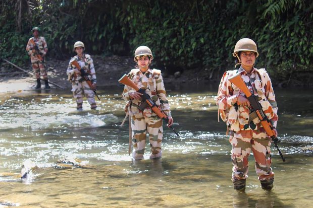 Armed female troops of Indo-Tibetan Border Police (ITBP) during a border patrol, on International Women's Day, in Arunachal Pradesh. (PTI Photo)