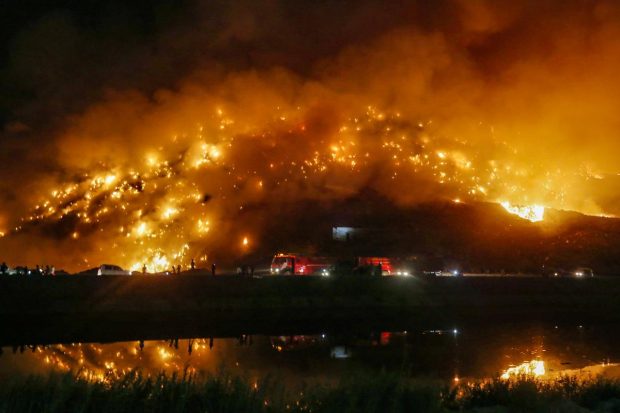 The fire broke out at the landfill site on Tuesday. (PTI Photo)