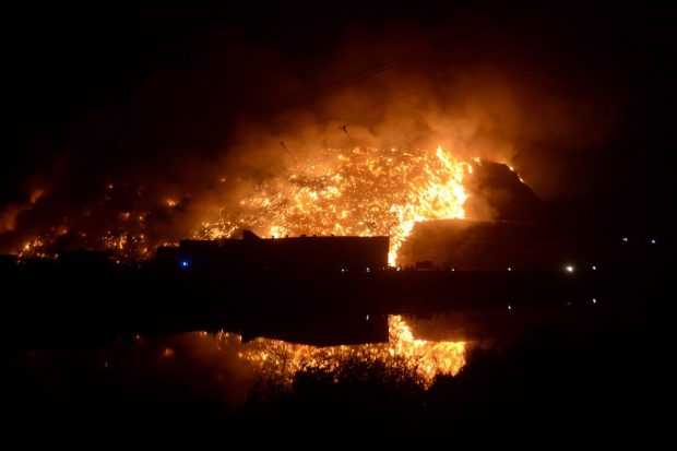 Three incidents of fire were reported this year at east Delhi's Ghazipur landfill site, including the one on March 28 which was doused after over 50 hours. (PTI Photo)